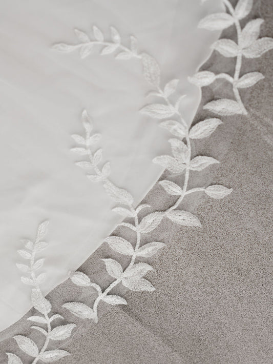 Trailing leaf beaded chapel length wedding veil